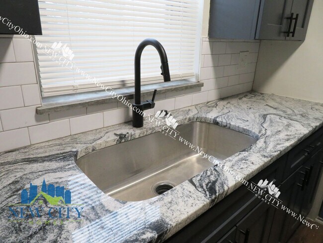 Building Photo - Newly Renovated Apartment Building