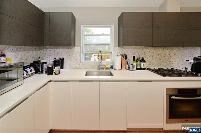 Building Photo - 38-55 van Riper Place Unit 1X