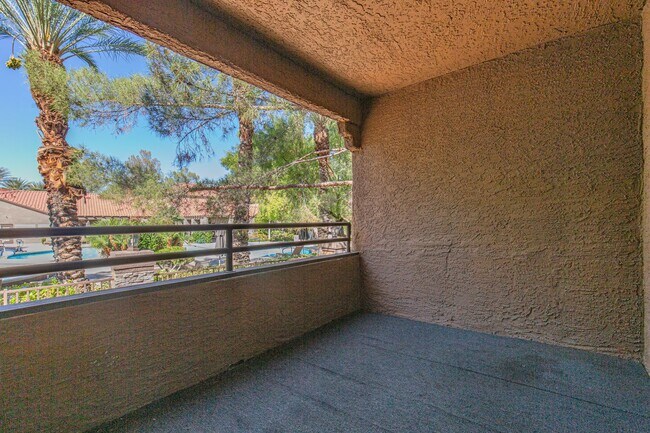 Building Photo - Second story unit overlooking pool in luxu...