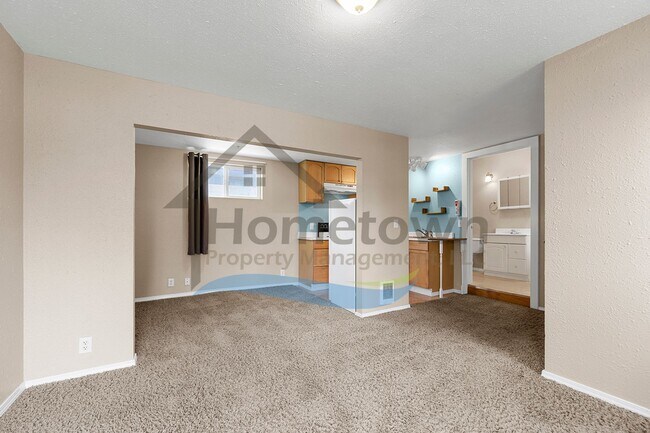 Building Photo - 1 Bedroom Cottage with Off-Street Parking Available in Midtown Coeur d'Alene!