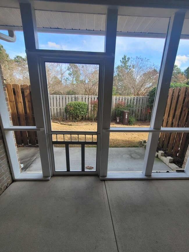 Building Photo - This 3 bedroom 2.5 bath brick townhouse with one car garage is located in Westgate Shoreline subd...