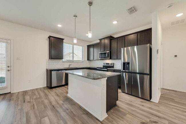 Building Photo - Fantastic newer 3-2-2 in Heartland Master Planned Community