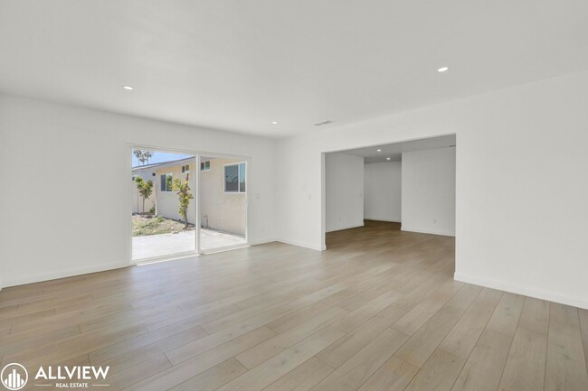 Building Photo - Fully Renovated 4-Bedroom Home with Firepl...