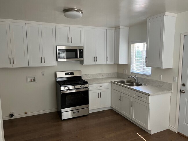 All New Kitchen Cabinets, Appliances and Quartz Counters - 9353 Lomita Dr