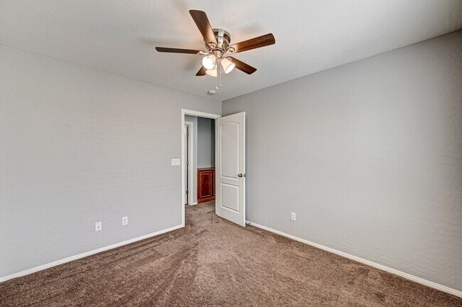 Building Photo - BEAUTIFUL GATED 2 Story, 3 Bedroom Home in...