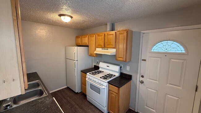 Building Photo - Studio Apartment in High Hollows Condominiums