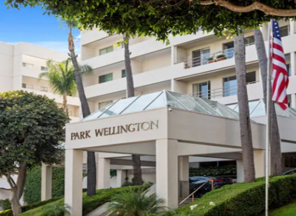 The building entrance, with 24-hour concierge - 1131 Alta Loma Rd