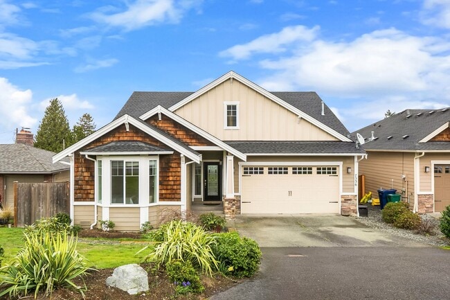 Building Photo - Water Views| Expansive Deck | Flexible Living Spaces