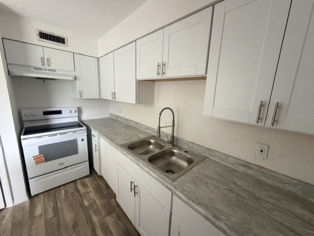 Renovated Kitchen - Cimarron Apartments