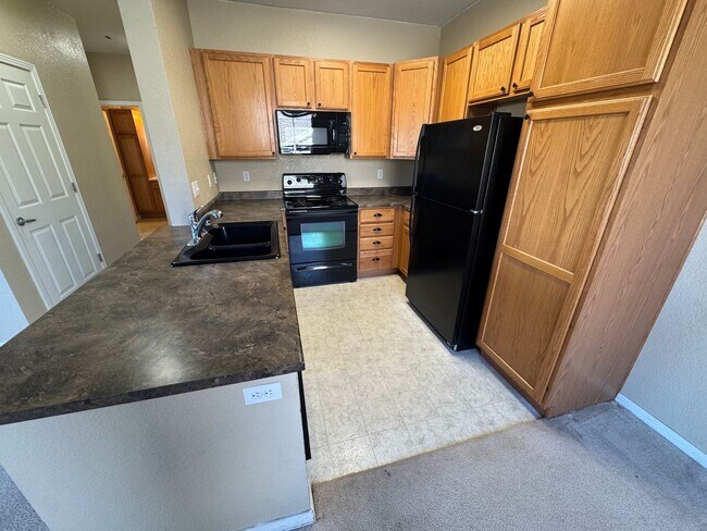 Building Photo - Move-In Ready Parker Condo with Stylish Upgrades & Patio