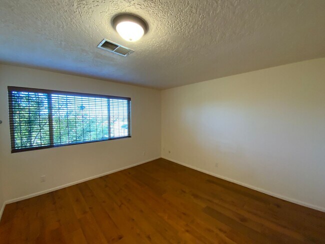 Building Photo - 4 Bedroom Single Story Home Available Near Tramway Blvd NE & Copper Ave NE!