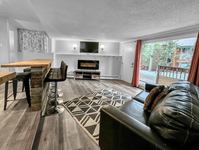 Building Photo - 2 Bedroom, 1 Bath on Peak 8! Updated unit, ground floor, great location!  Heat included!