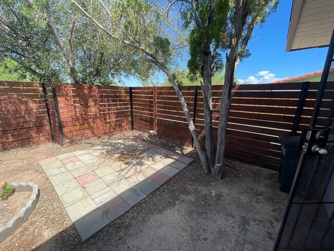 Building Photo - OPEN HOUSE! Remodeled Two Bedroom, End Unit with A/C and Large Fenced Yard