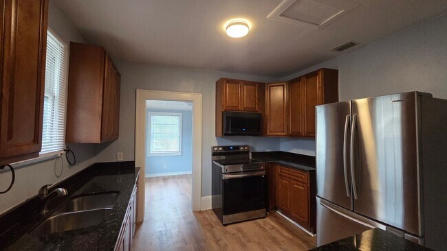 Building Photo - Affordable 3 Bed in Jacksonville. Bonus Room. Fenced in yard. Garage + Modern Bathroom