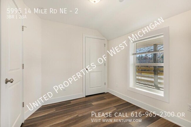 Building Photo - 5995 14 Mile Rd NE