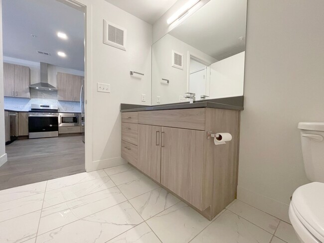 Building Photo - Improved Price!!!! Bustling Location! Mode...