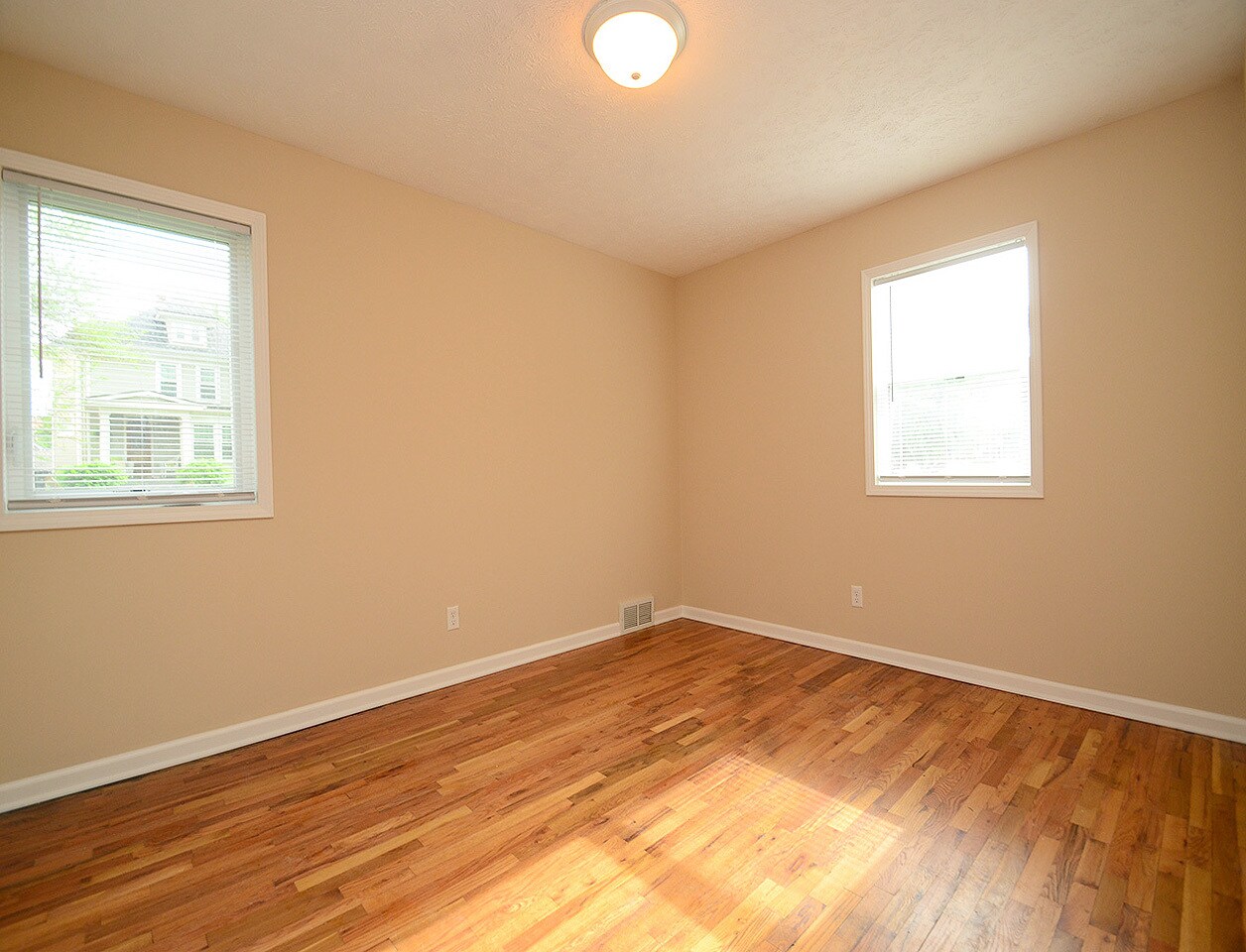 Two windows of bedroom 1 - 3903 Cass St