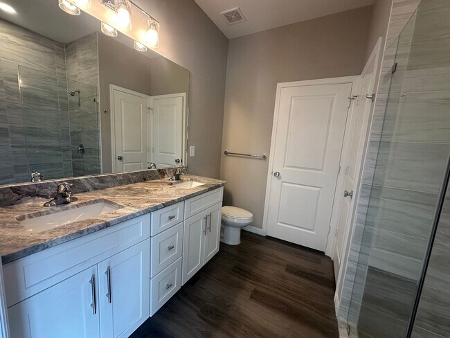 Building Photo - AVAILABLE MID APRIL- 4 Bedroom 2 bathroom 3 Car Garage NE Cape Coral Home with Screened Lania