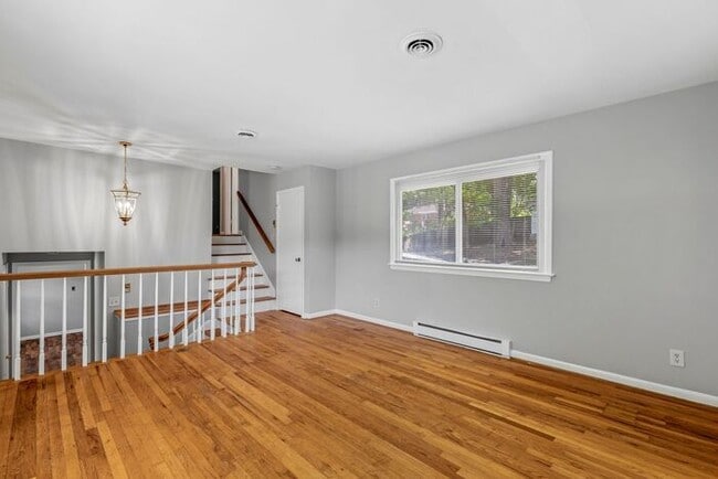 Building Photo - Large Home in Four Seasons Area, Hardwoods, Dining Room, Screed Porch, Fenced!