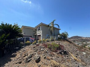 Building Photo - Gorgeous for 4 Bedroom and gated community