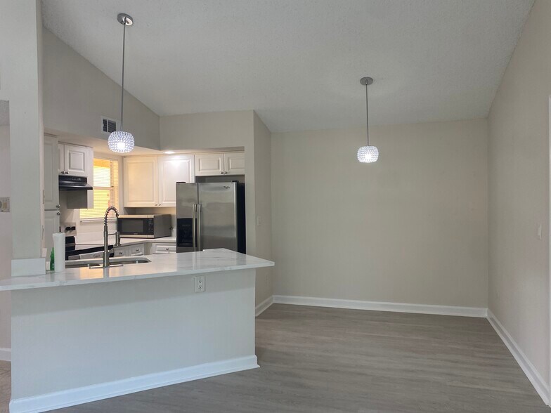 Kitchen and Dining Area - 4512 Commander Dr