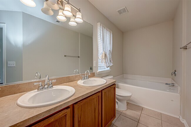 Building Photo - 5910 Spring Sunrise Dr