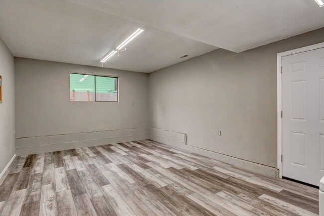 Building Photo - Spacious 4-Bedroom Home with Modern Upgrad...