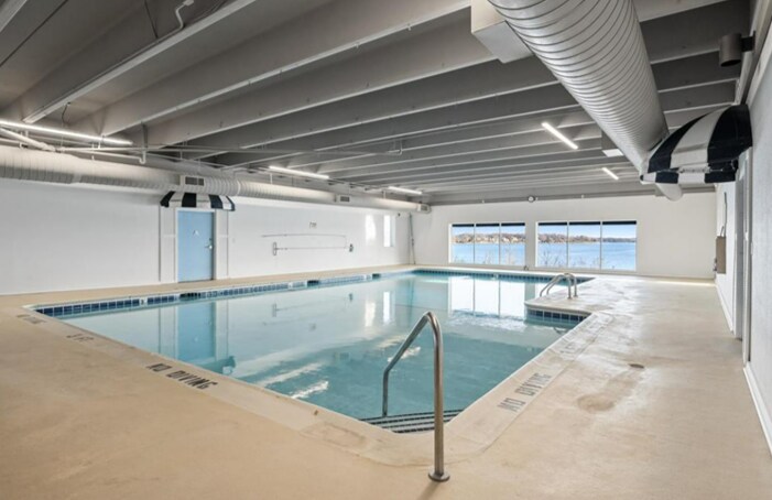 Floor to Ceiling Windows Looking at Lake - 4371 Wilshire Blvd