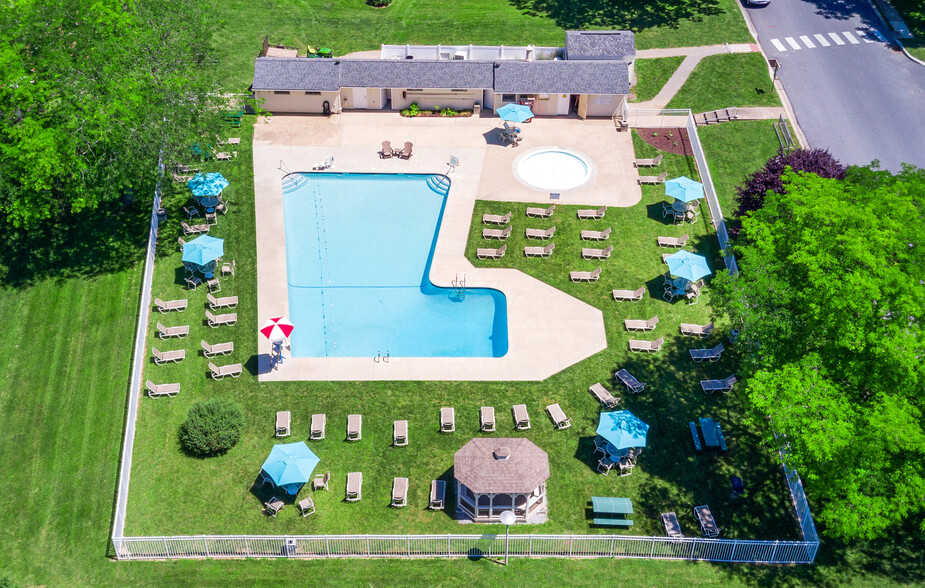 Seasonal Swimming Pool and Wading Pool- Guarded by Certified Lifeguards - Manor House Apartments