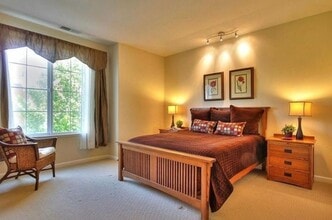 Building Photo - UPGRADED TOWNHOME IN RIVERMARK SOUGHT-AFTER WALK-UP SETTING