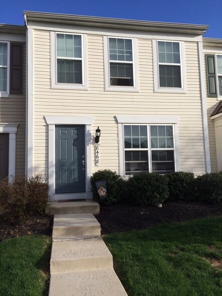 Front of the house from street. Lawn and snow removal taken care of for you - 8468 Cromwell Court