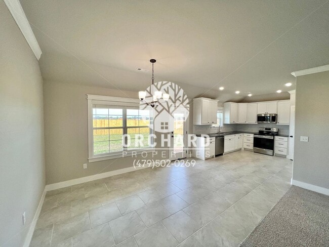 Building Photo - Tontitown- Single-Family Home- Desirable Huntley Plan