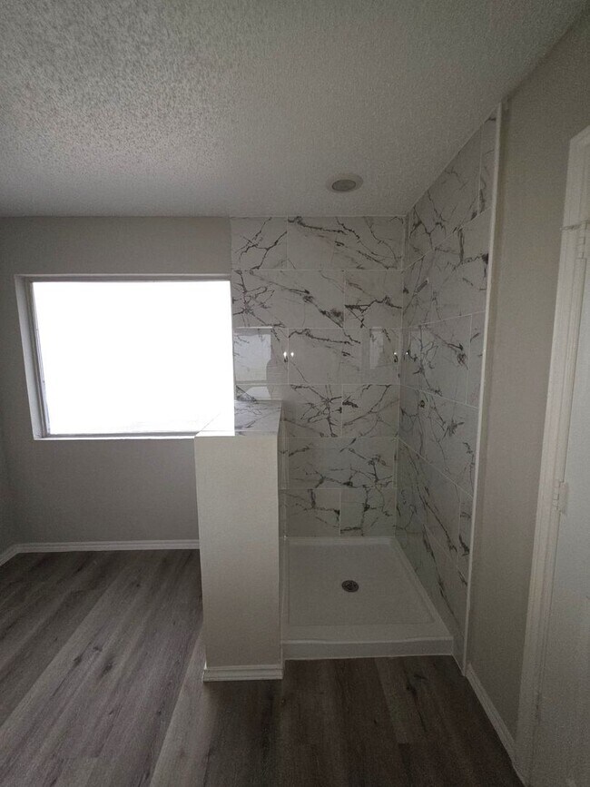 Building Photo - Spacious 4-Bedroom Home with Pool & Spa in...