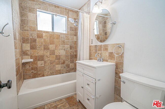 Building Photo - 7044 Garden Grove Ave