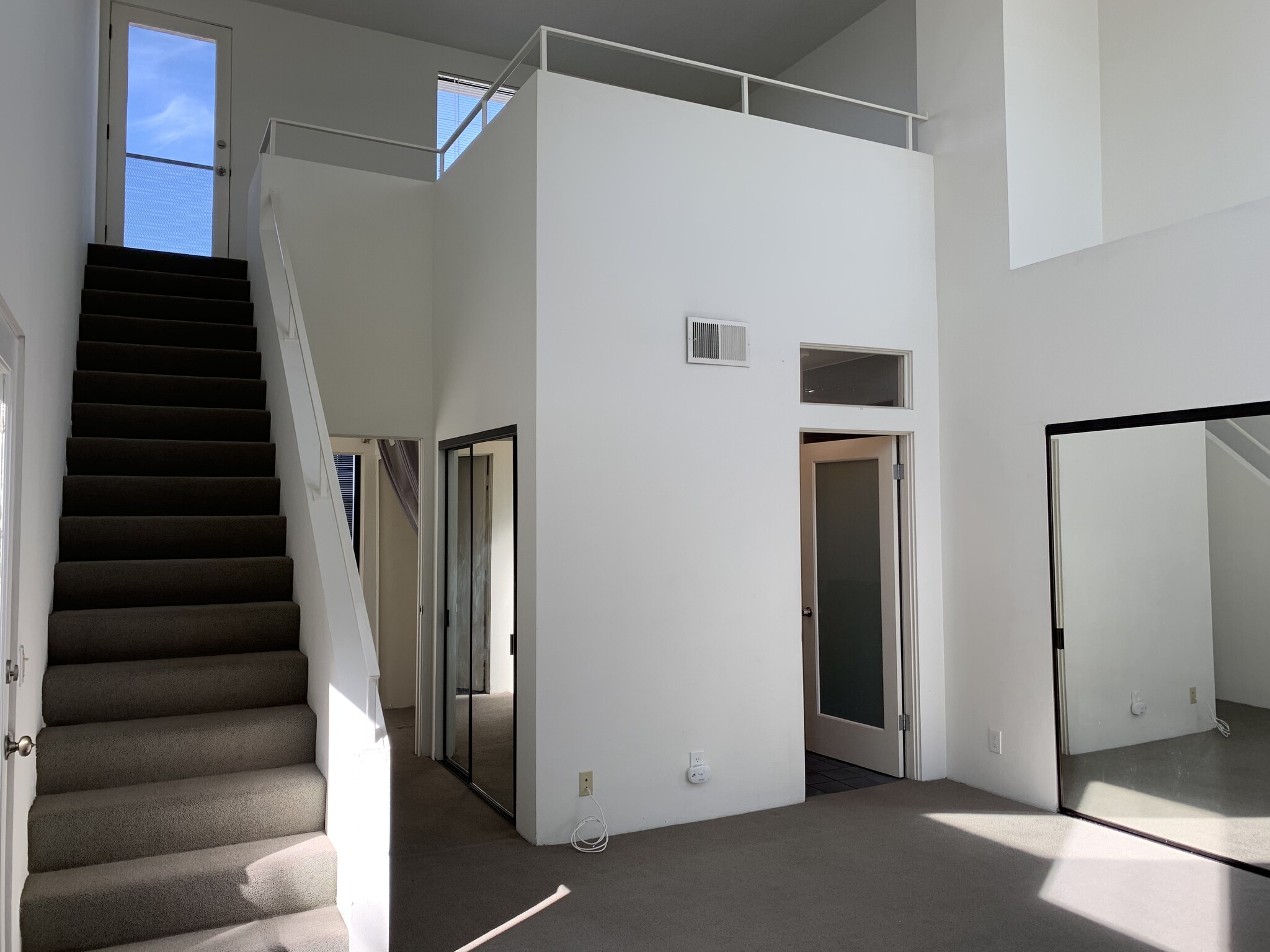 Stairs to Loft from Primary Bedroom - 3675 Keystone Ave