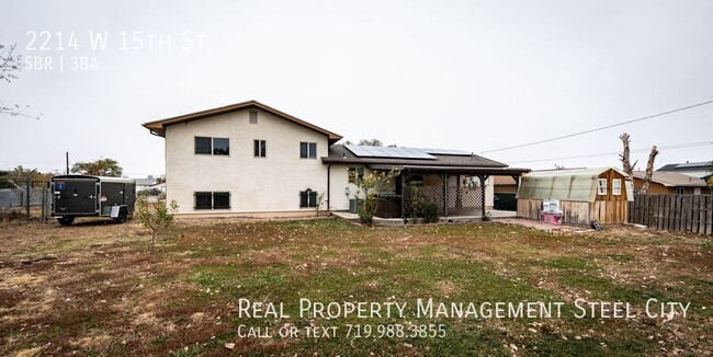 Building Photo - Spacious 5-Bedroom Home with Solar Panels ...