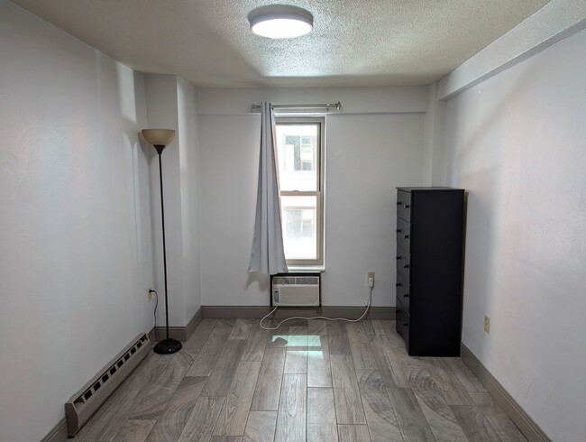 Building Photo - High Rise Living Directly Across the Street from Campus!