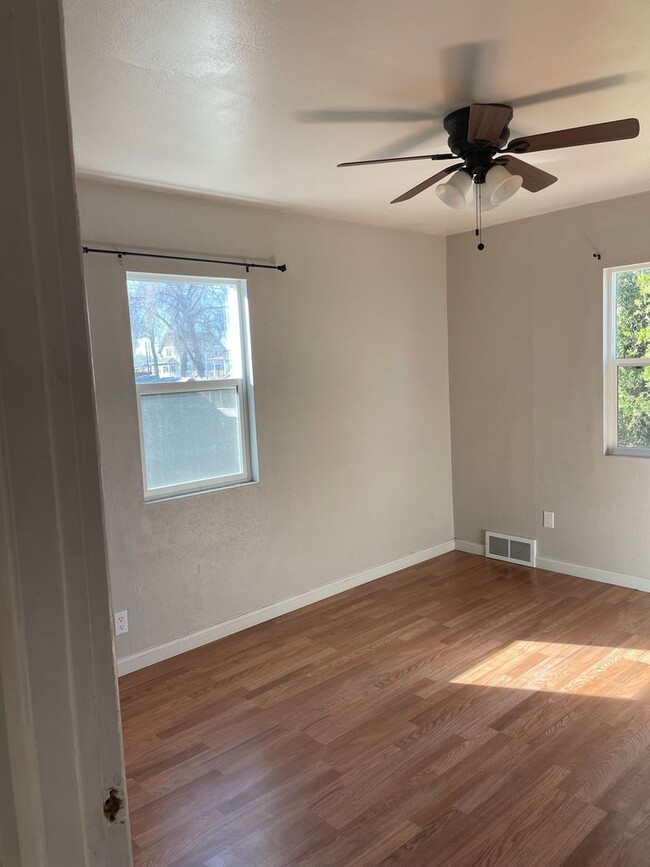 Building Photo - Adorable 2 Bedroom, 1 Bathroom Home with Huge Fully fenced Yard and detached garage, Move-In Ready!