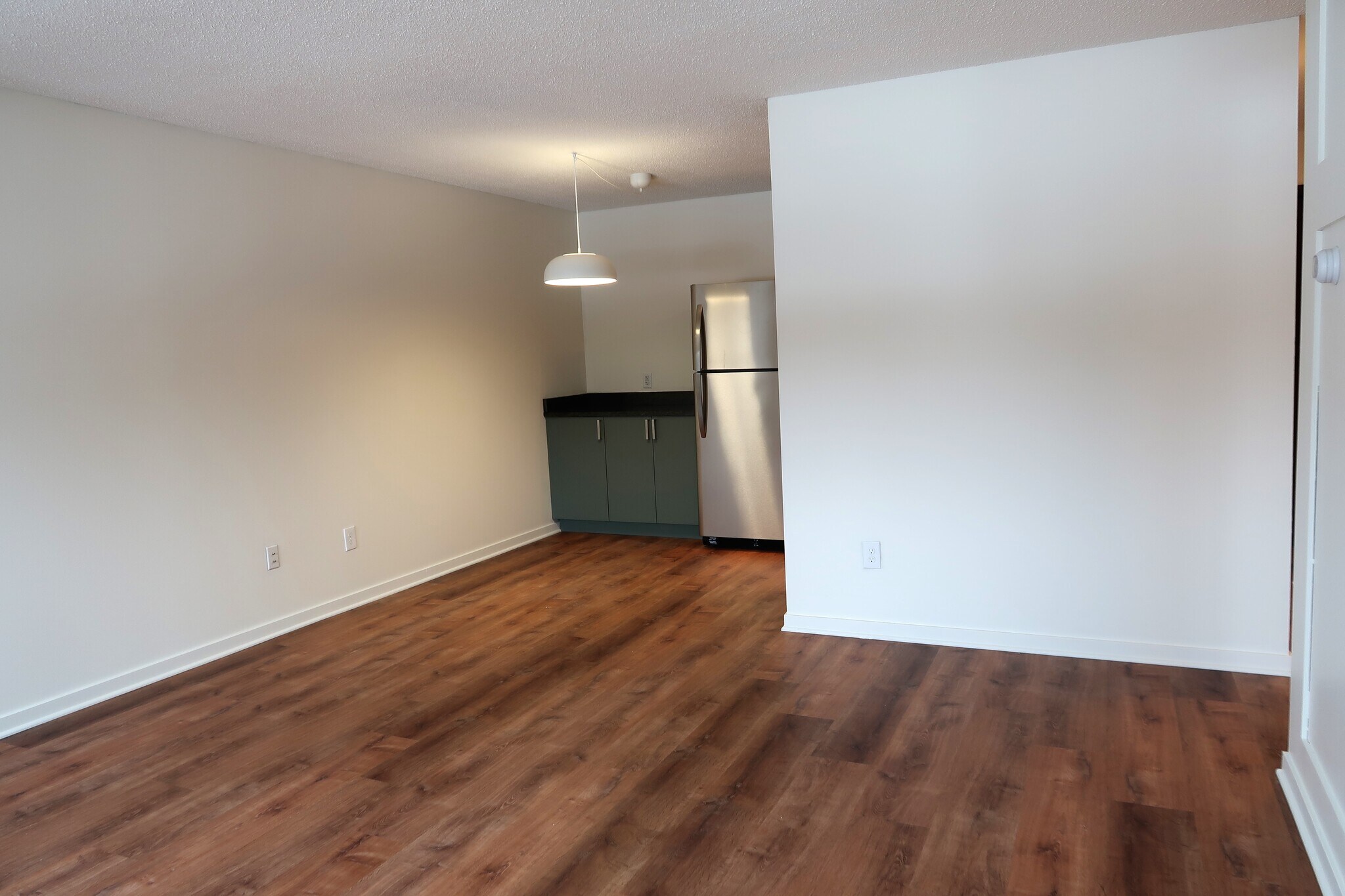 Living room to kitchen - 2616 Harriet Ave S #203