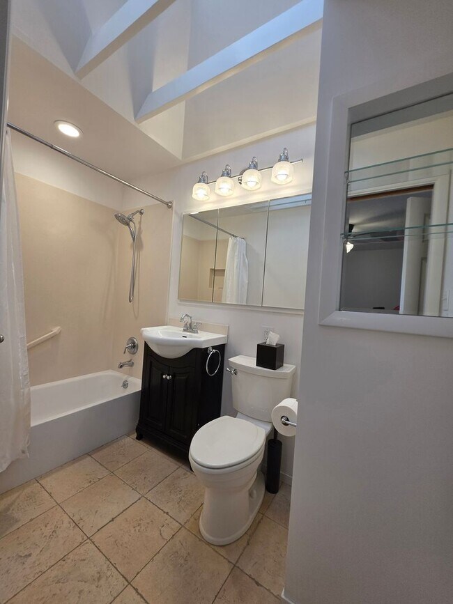 Building Photo - Delightful Single Story 2/2 with Expanded Bath and Beautiful Gardens
