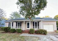 Building Photo - 5136 Double Oaks Dr