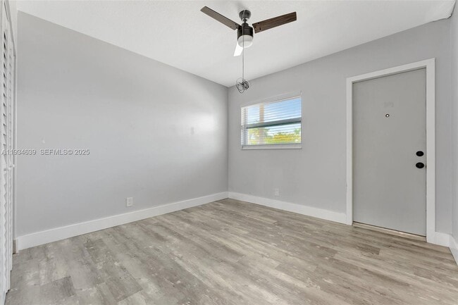 Building Photo - 1400 NE 57th Ct