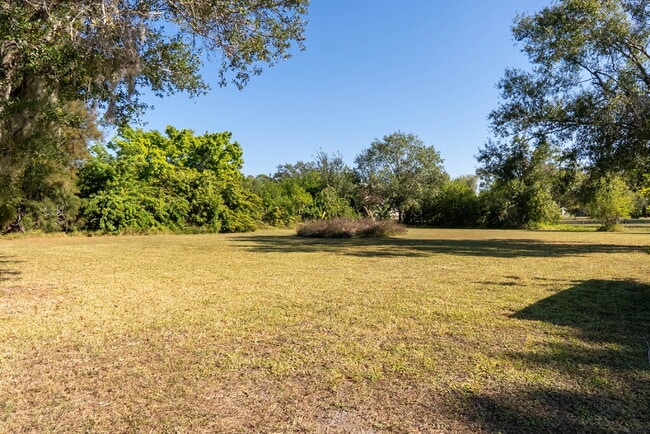 Building Photo - Country-Style Sarasota Living on a Full Acre - Pool Home with Oversized Workshop — Move-In Ready Now