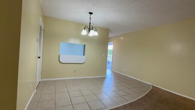 Building Photo - 12009 Poinciana Blvd