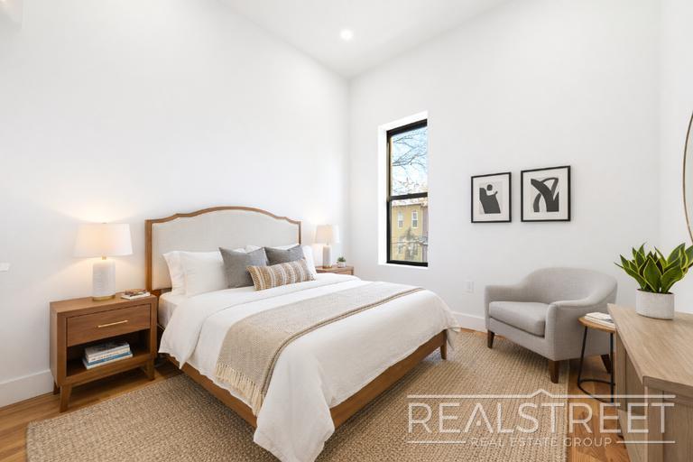 Building Photo - Brand New 4 Bed, 2 Bath with In-Unit Laundry, Private Balcony & Central Air