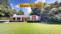 Building Photo - Earn Wealth While Leasing - Like a Homeown...