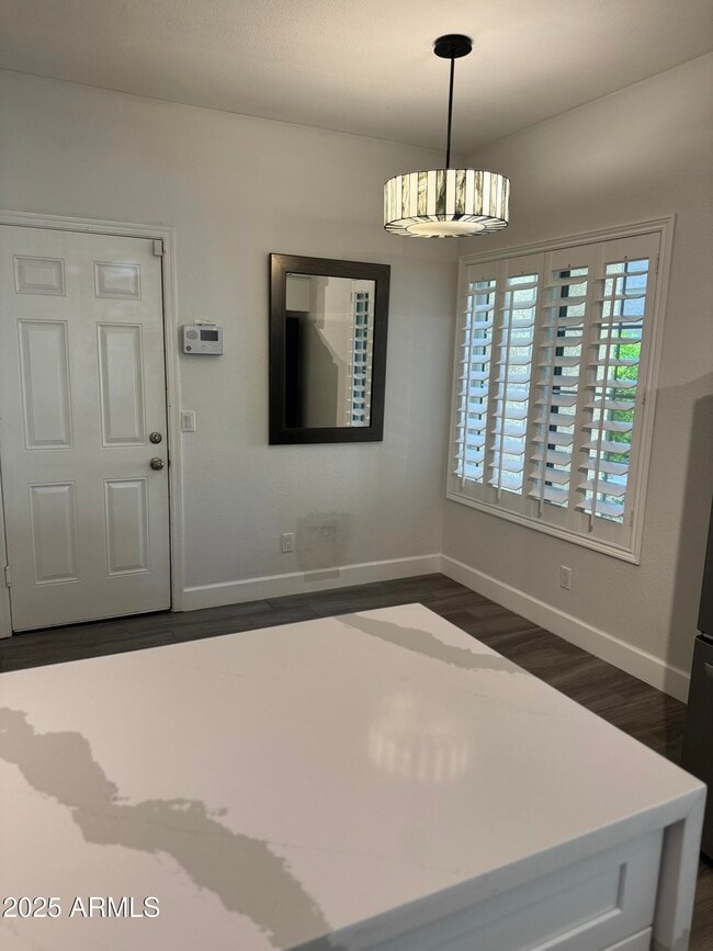 Building Photo - 7960 E Pepper Tree Ln