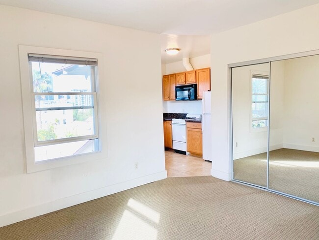 Building Photo - STUDIO WITH A PEAK VIEW OF DOWNTOWN! $1,49...