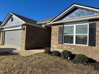 Building Photo - Stylish 4BR/2BA Home with Garage & Privacy...