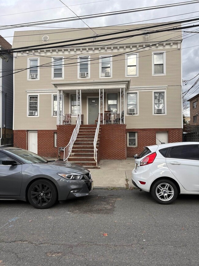 Building Photo - 121-123-123 W 25th St